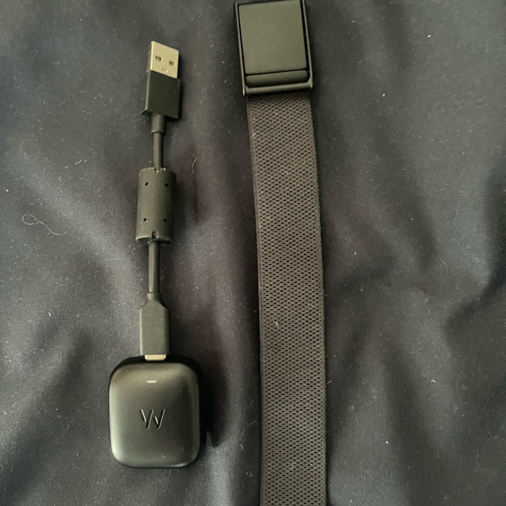 Whoop 4.0. Worn three time. I like my Fitbit better.